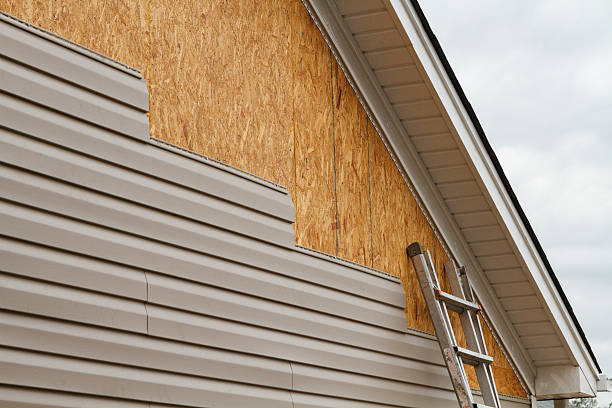 Professional Vinyl Siding technician working in Waverly, NY